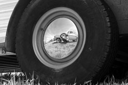 self prtrait in hubcap